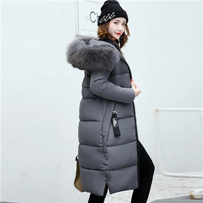 Women's long winter coat with fur collar, tailored full-length silhouette, sustainable elegant style