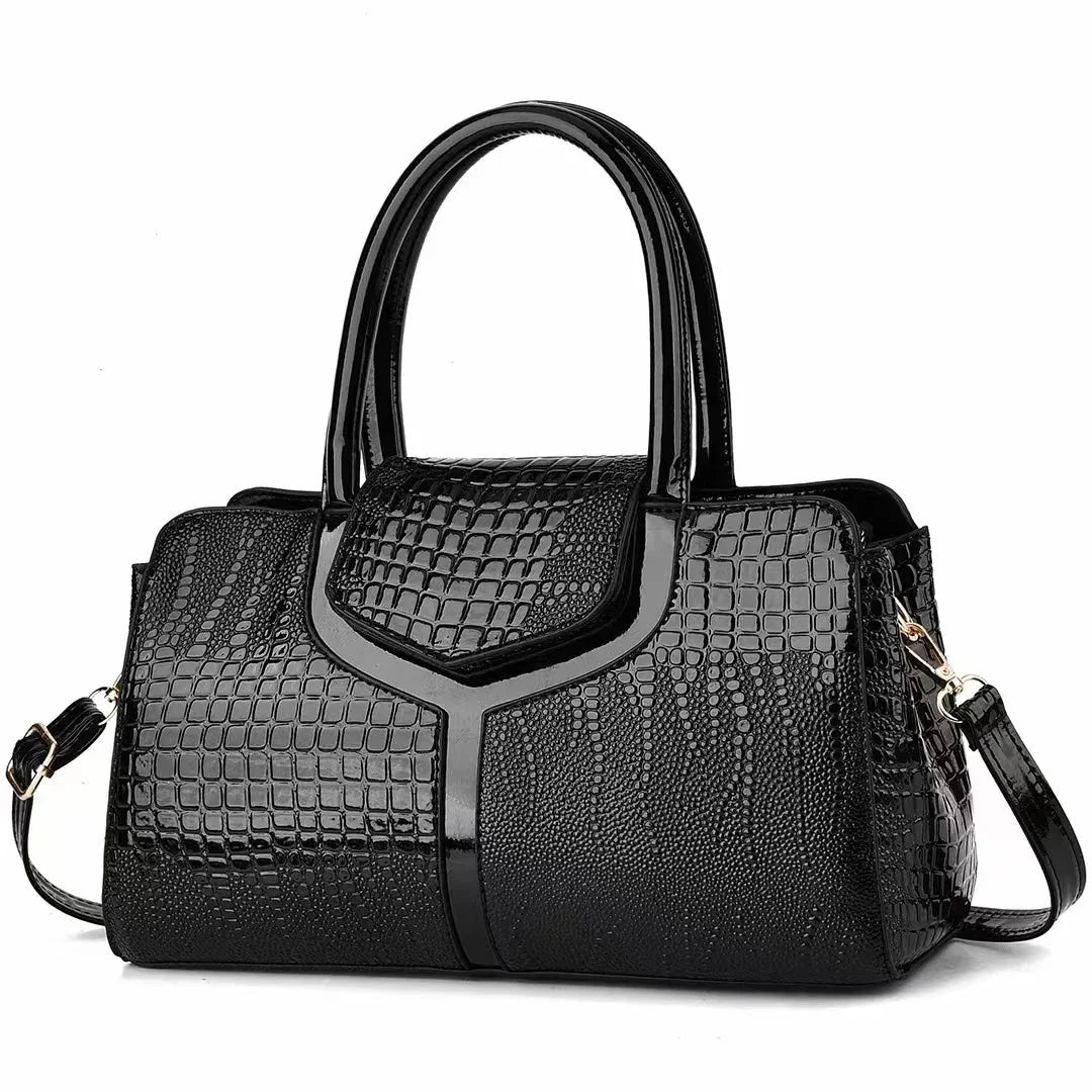 Women's structured brown embossed leather satchel bag with polished silhouette for everyday use