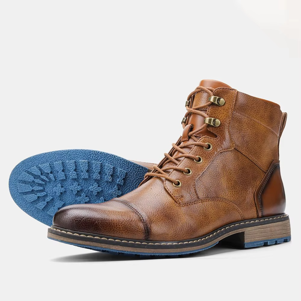 Men's brown full-grain leather ankle boots with polished finish, sleek office-to-weekend style
