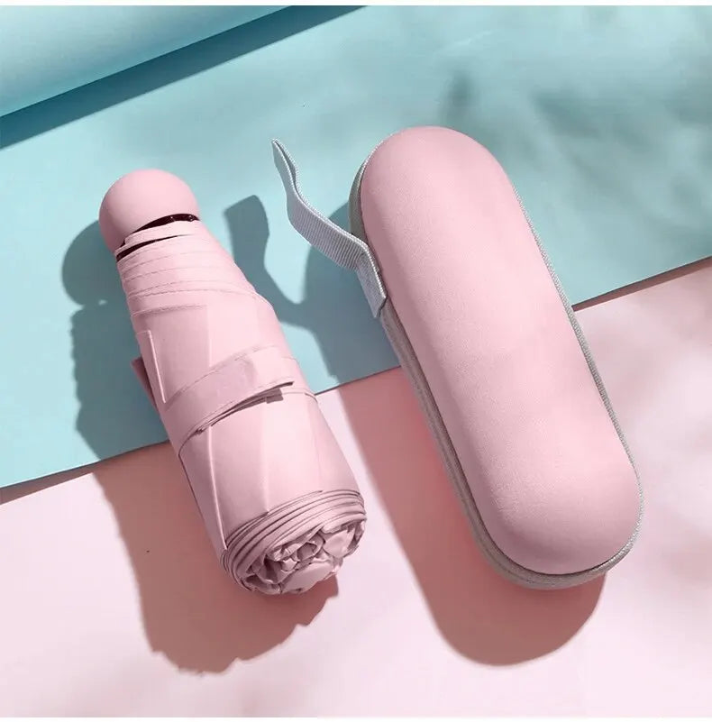 Mini capsule umbrella ultra-portable UV sun rain shield compact travel size fits pocket or purse