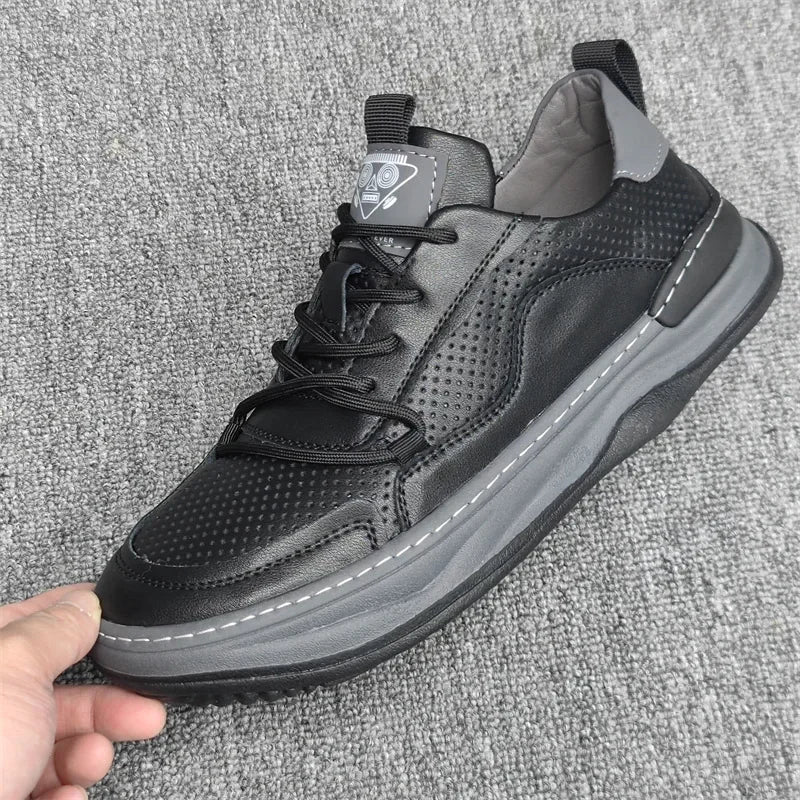 Men's white leather sneakers with breathable mesh panels and cushioned anti-slip sole for daily wear