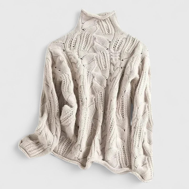 Women's cable knit turtleneck sweater, relaxed fit with intricate openwork detailing for cozy layering