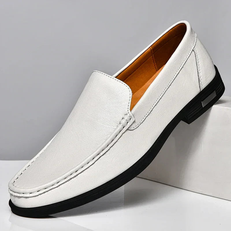 Men's brown embossed leather slip-on loafers with textured dress shoe design for all-day comfort