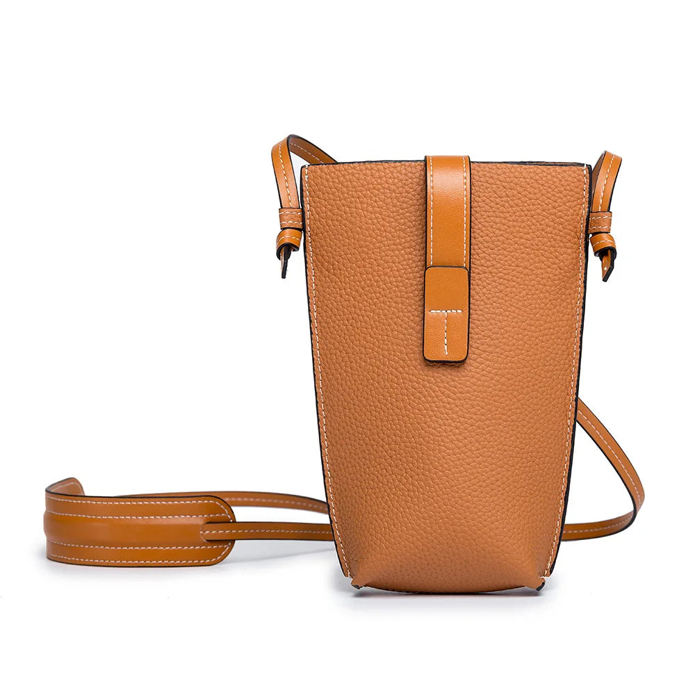 Women's compact vertical crossbody bag in vegan PU leather with adjustable strap for on-the-go style