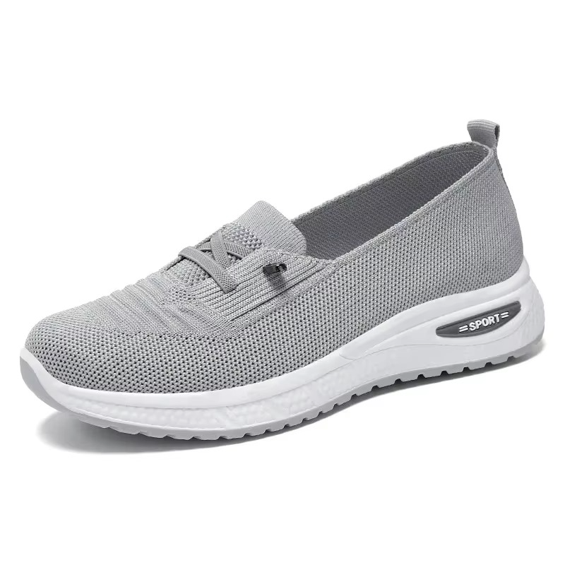 Women's pink lightweight casual sneakers 2025 with breathable textile upper and thick cushioned sole