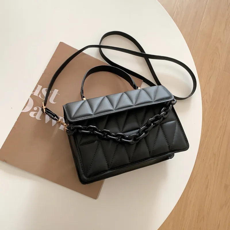 Nerys quilted handbag with bold gold chain handle, chic timeless silhouette for everyday fashion