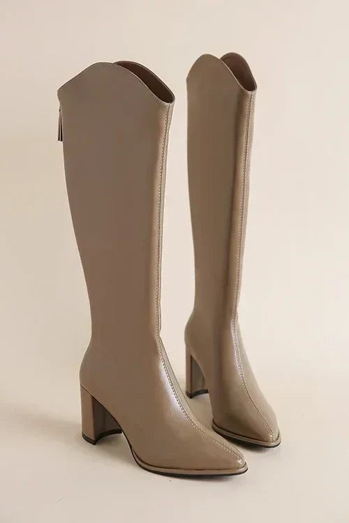 Women's Adele black leather knee-high boots with elegant silhouette and durable rubber sole
