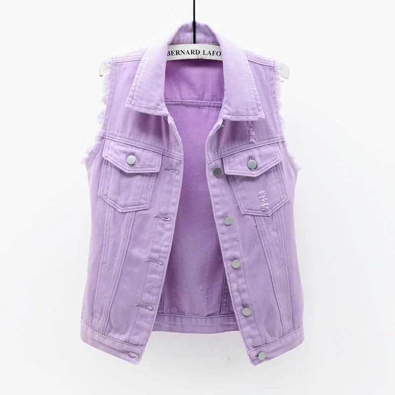 Oversized indigo denim vest with distressed edges, multi-pocket design, and heavyweight streetwear cut