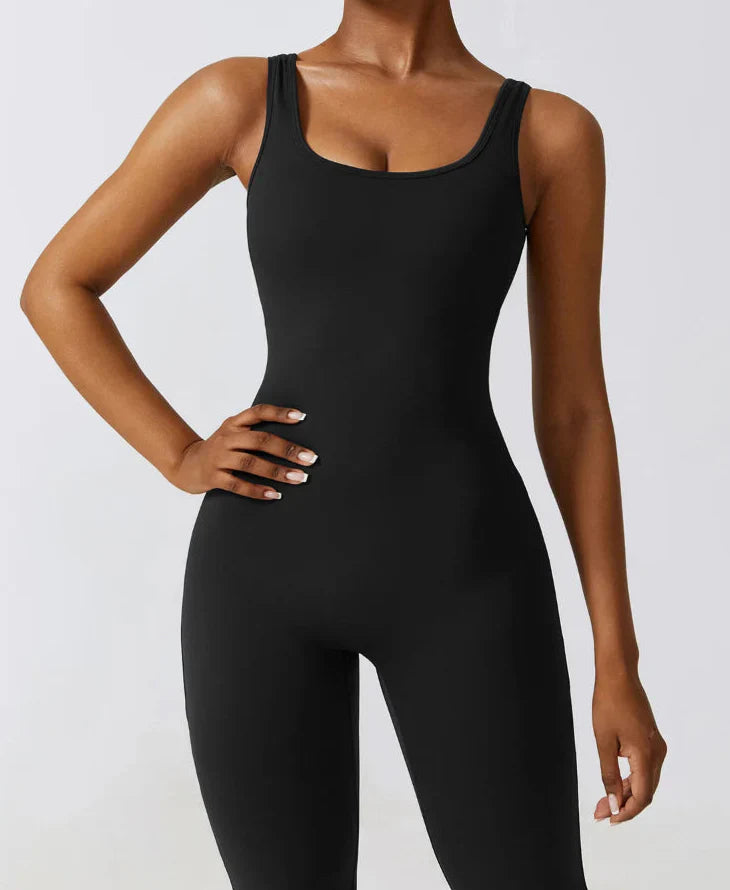 Women's black seamless compression training jumpsuit with sculpted fit and breathable fabric for high-intensity workouts