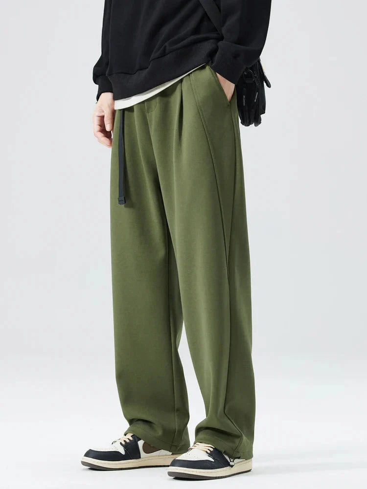 Men's gray relaxed fit fleece sweatpants with elastic belt waistband for cozy everyday wear