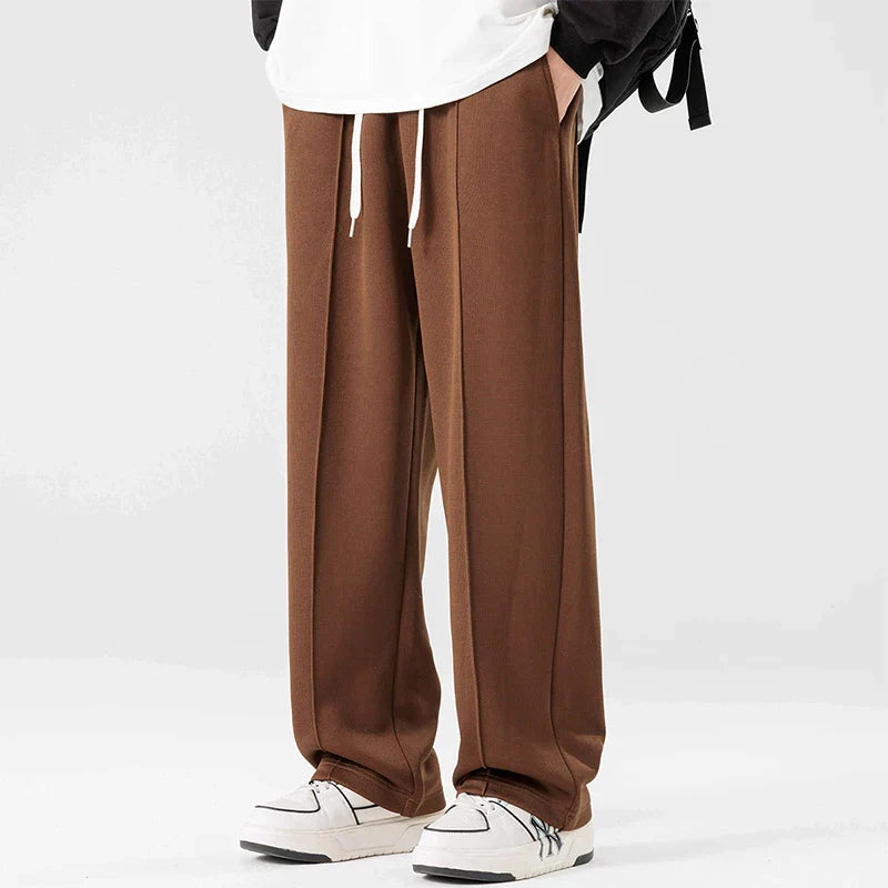 Gray relaxed straight-leg sweatpants with minimal stripe detail, midweight cotton blend for gym and lounge