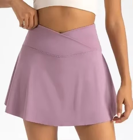 Women's high waist active tennis skirt with built-in shorts, pockets, compression fit for free movement