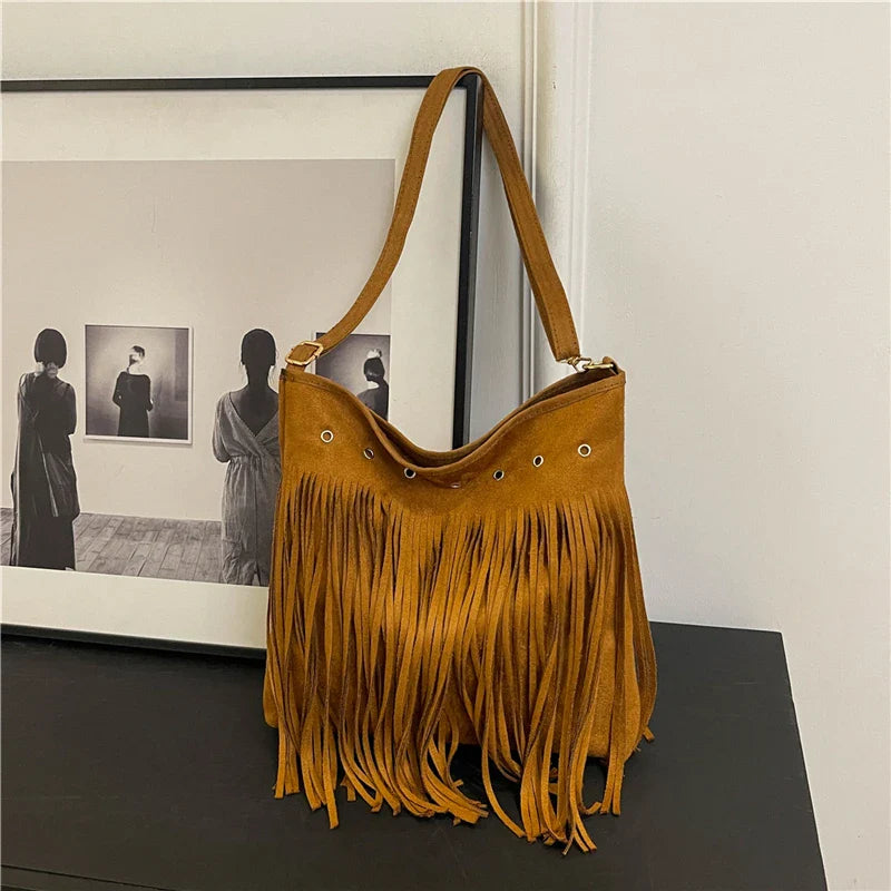 Boho fringe shoulder bag faux suede tan hobo silhouette with eyelet details lightweight festival style