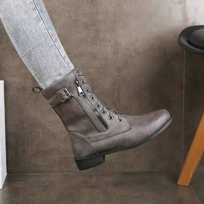 Women's black premium leather mid-calf combat boots with lace-up closure and buckle detail