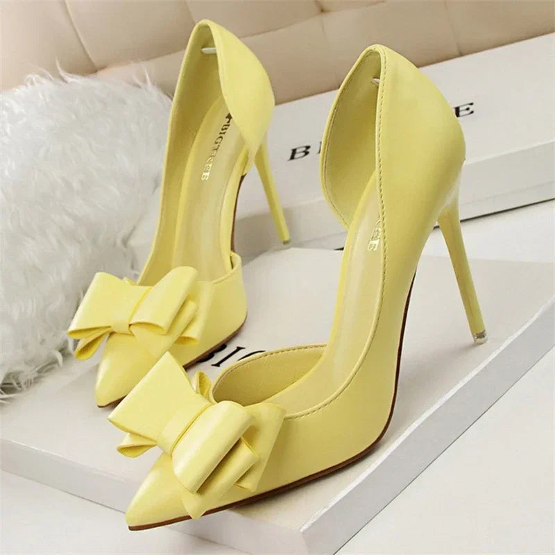 Pointed toe pumps with elegant bow detail, slim 11cm heel, chic formal style for women