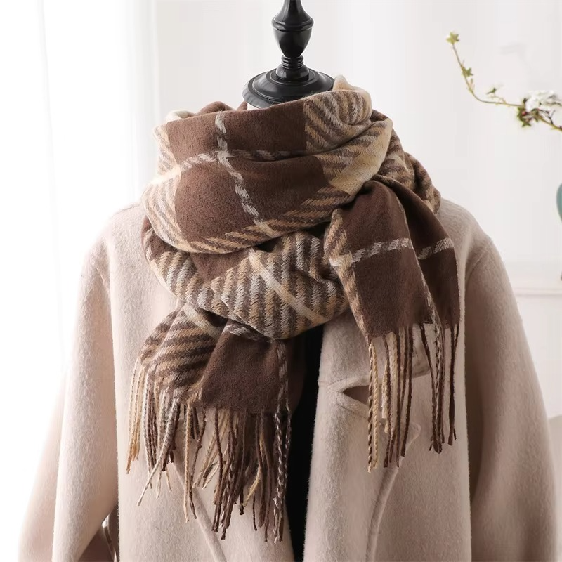 Women's thick cashmere-blend plaid winter scarf in neutral tones with fringe tassels