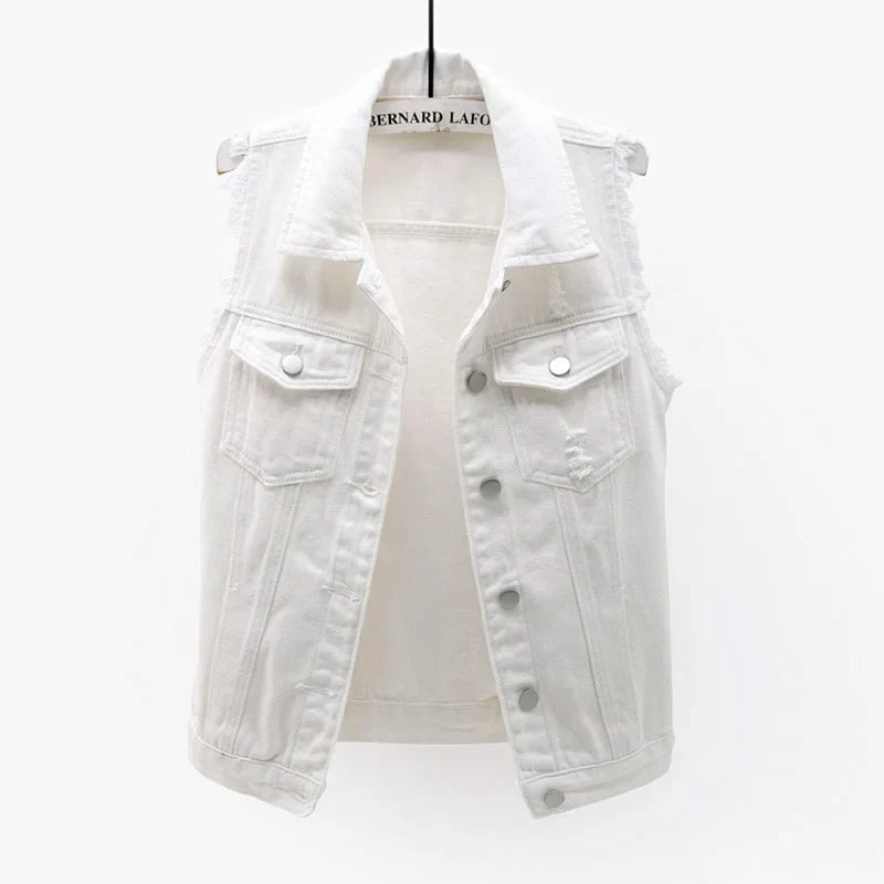 Oversized blue denim vest with distressed edges, multi-pocket streetwear design and heavyweight fabric