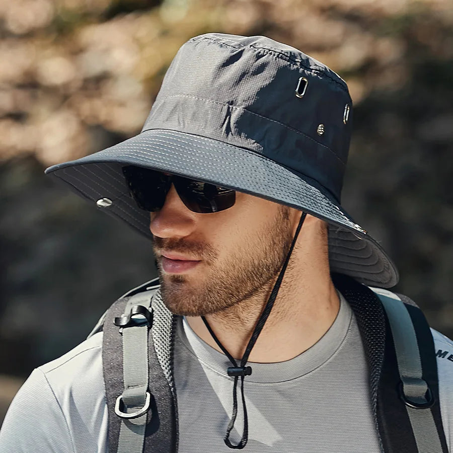 Packable SunGuard outdoor hat with breathable perforations, moisture-wicking sweatband, and full neck coverage