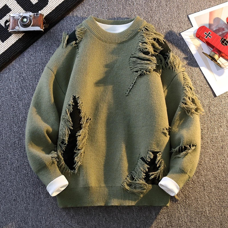 Beige relaxed-fit distressed knit sweater with frayed textured accents for layered everyday styling