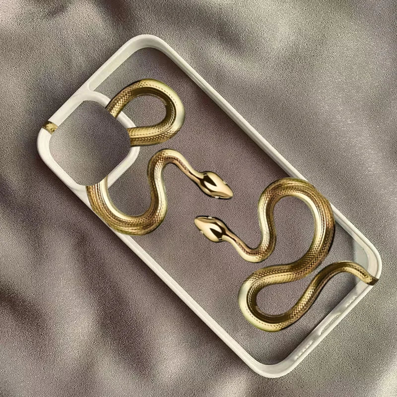 Crystal clear iPhone case featuring gold sculpted serpent Medusa accent, shockproof premium protection