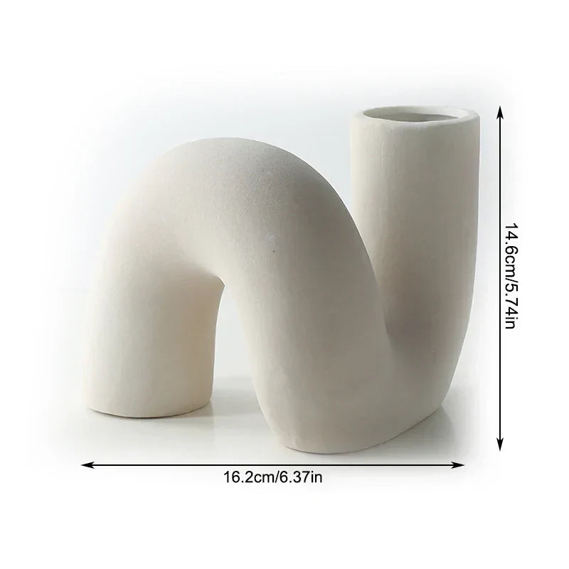 Stellan modern ceramic abstract vase with sculptural silhouette, striking artful decor for floral displays