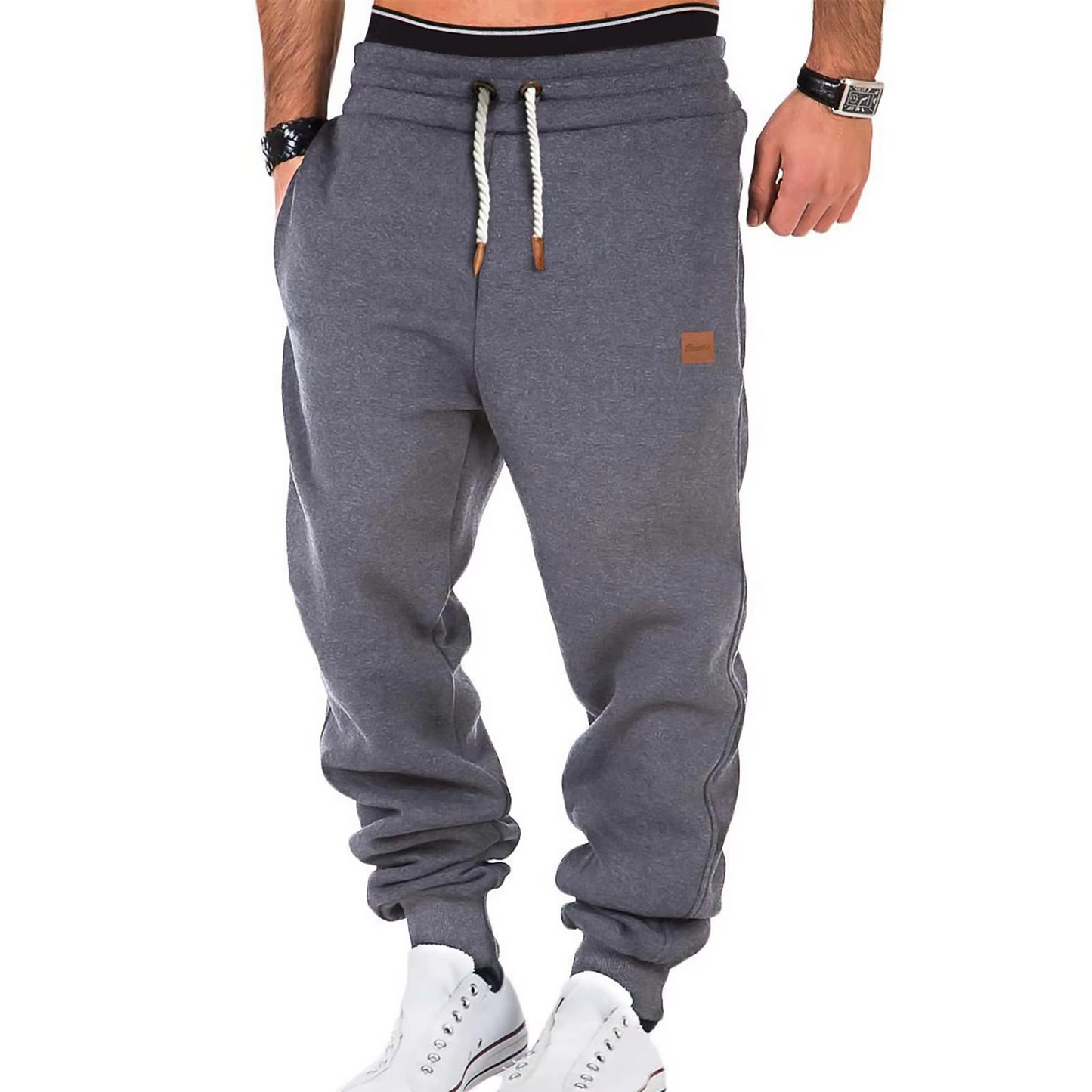 Men's gray casual jogger pants with plush lining, tapered fit, and adjustable drawstring waistband
