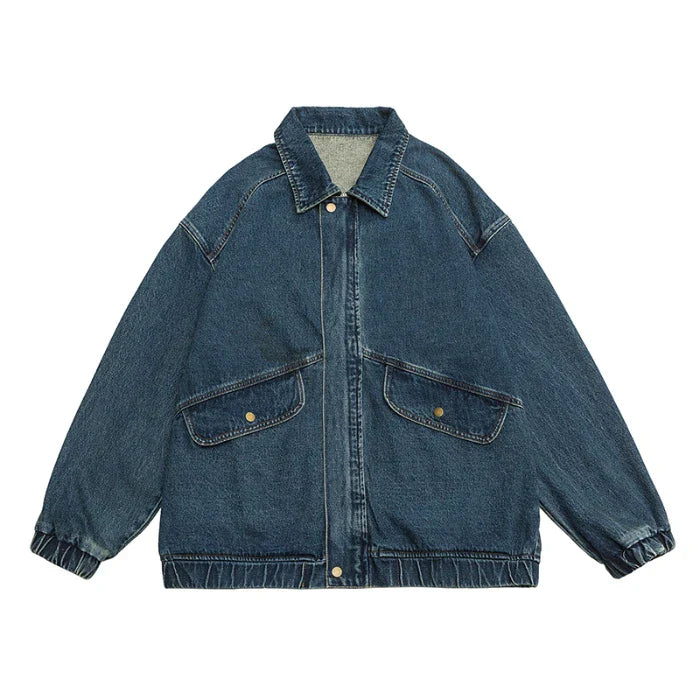 Medium wash oversized boxy denim jacket with draped sleeves and retro streetwear style