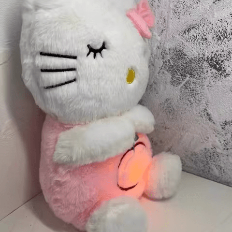 Breathing plush sleep aid toy with soothing music and rhythmic movements for kids and adults