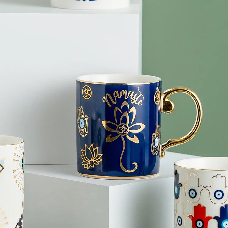 Evil Eye ceramic coffee mug gold trim Turkish craft positivity protection symbol design
