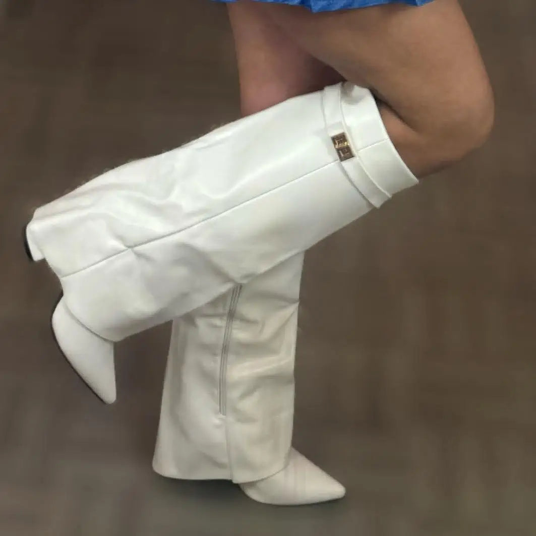 Black leather thigh-high boots with buckle detail, elegant slim silhouette for women