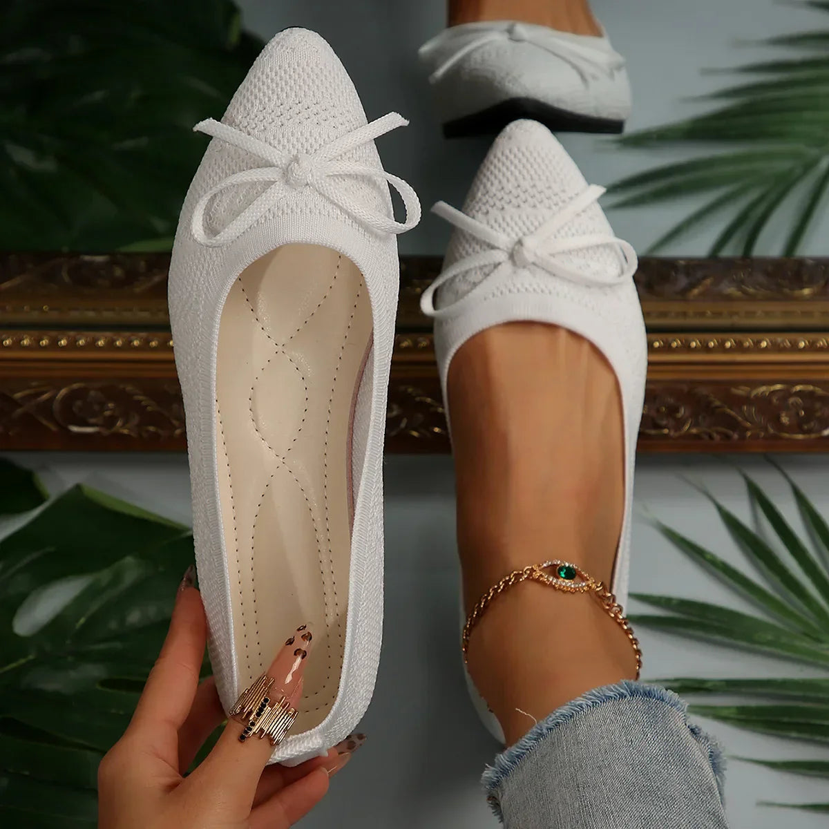 Women's knit flats with tassel bow accent, lightweight breathable mesh upper, casual chic style