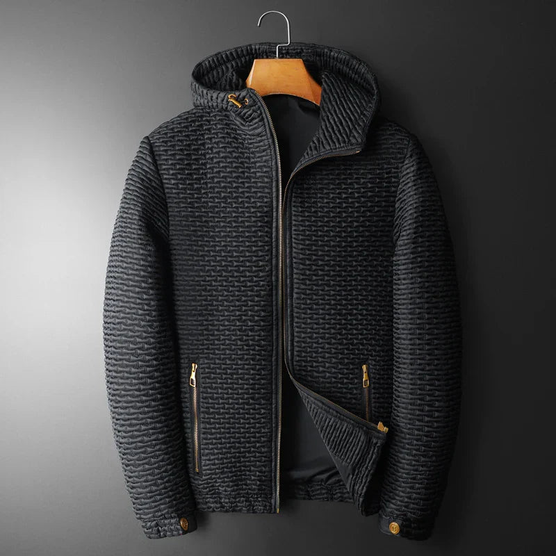 Black micro-quilted hooded canvas jacket with cotton lining, lightweight fit, and gold hardware accents