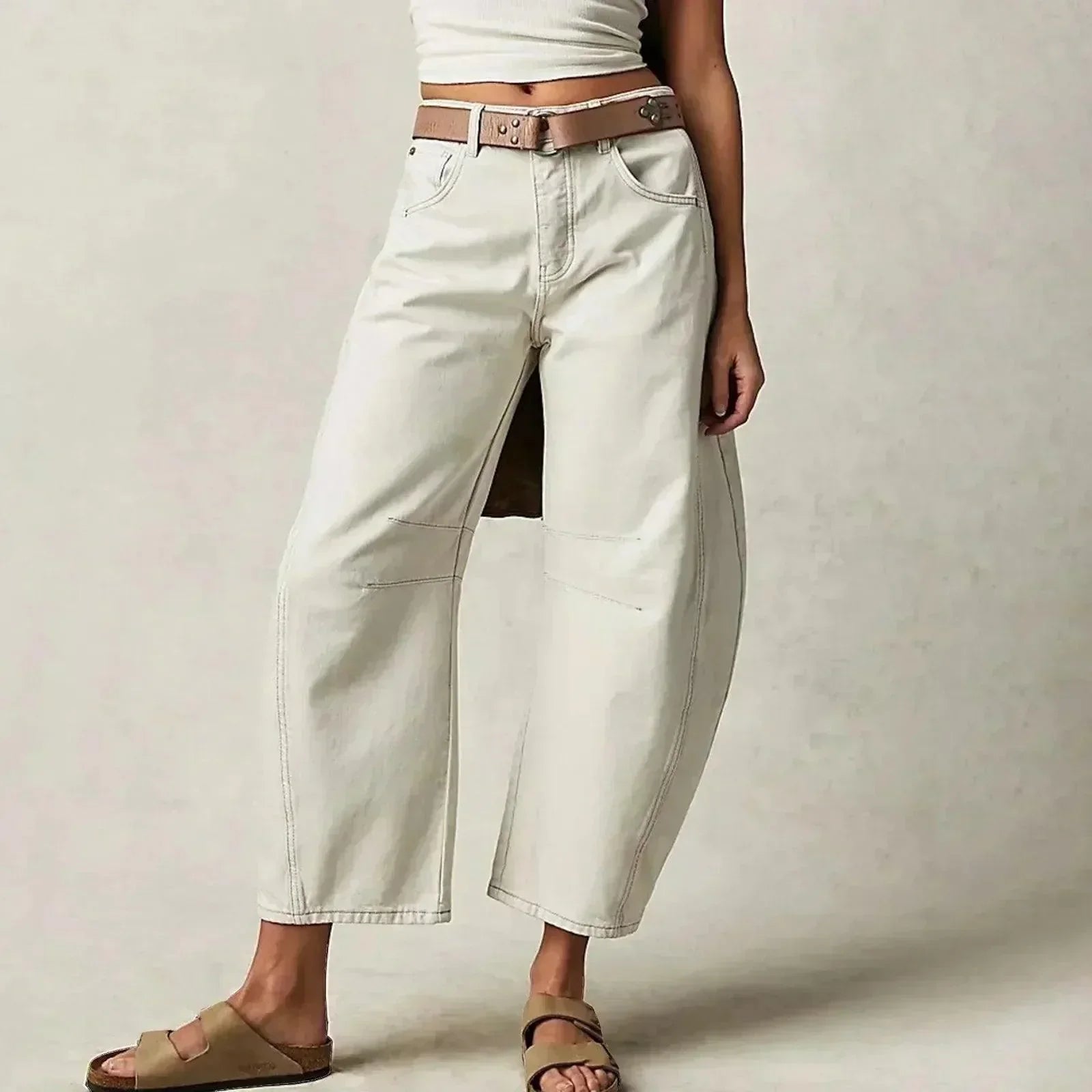 Women's relaxed fit high waist pants in neutral tone, flattering hip cut for all-day comfort