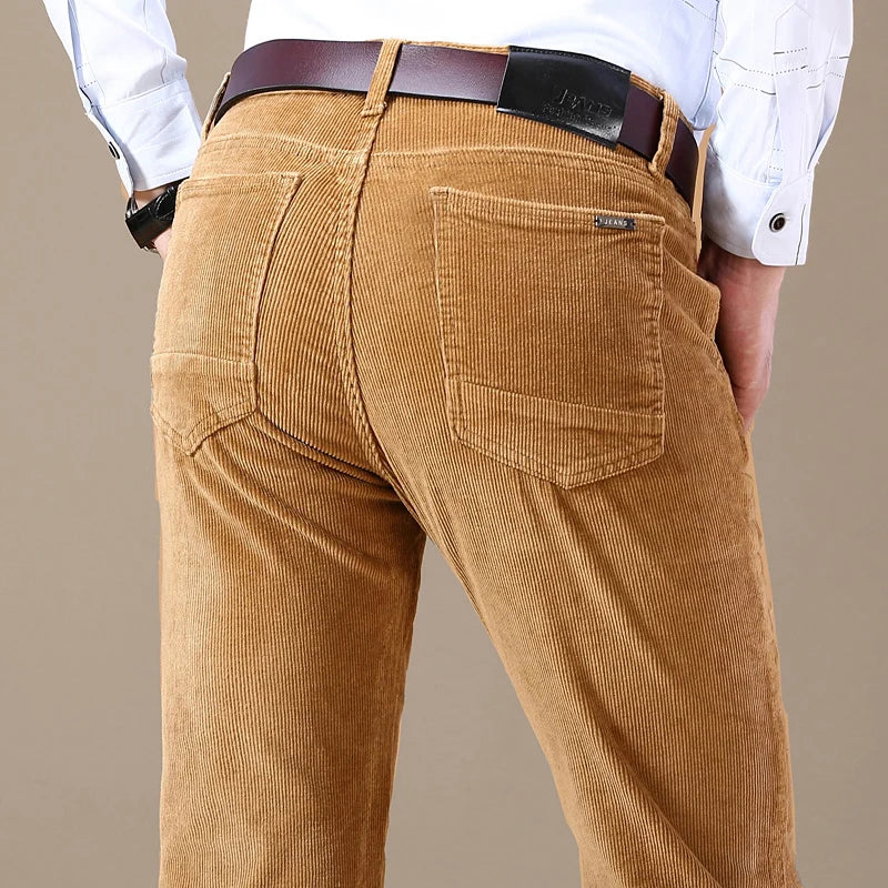 Men's brown corduroy slim-fit pants with elastic waistband for versatile everyday wear