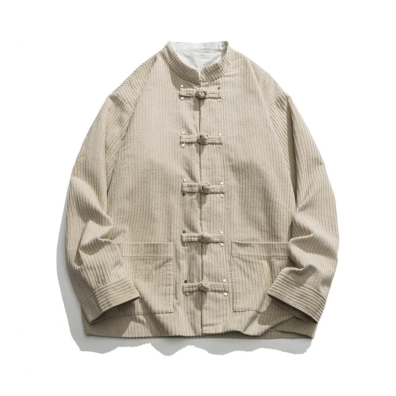 Oversized corduroy jacket with embroidered frog closure in solid tone, Eastern-inspired silhouette