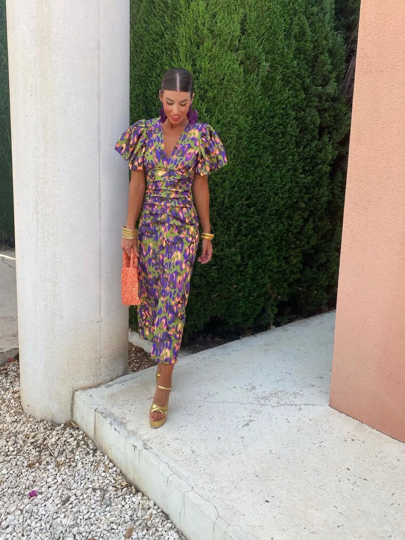 Women's vibrant pleated dress with elegant pleated sleeves, versatile style for all occasions