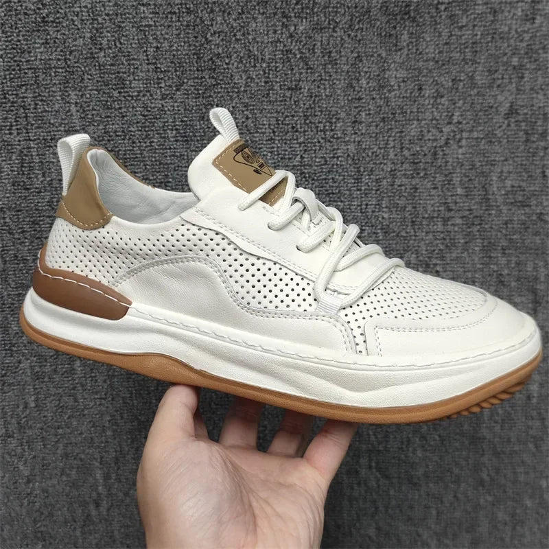 Men's white leather sneakers with breathable mesh panels, cushioned insole, and anti-slip traction sole