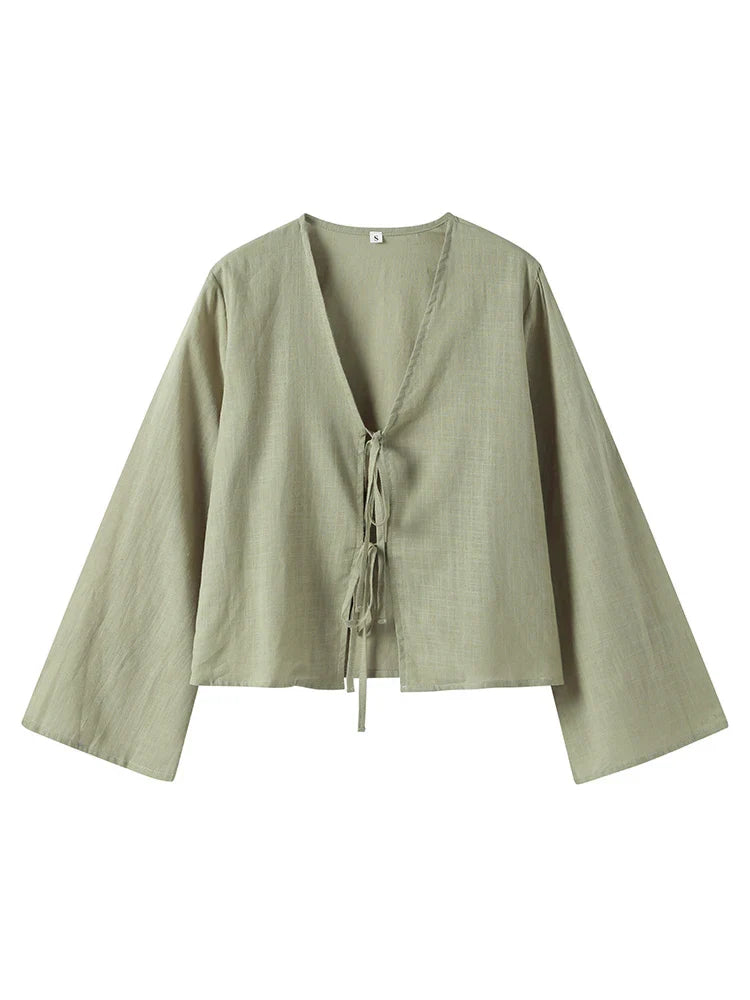 Women's white linen cropped top with front-tie closure, breezy relaxed fit for summer