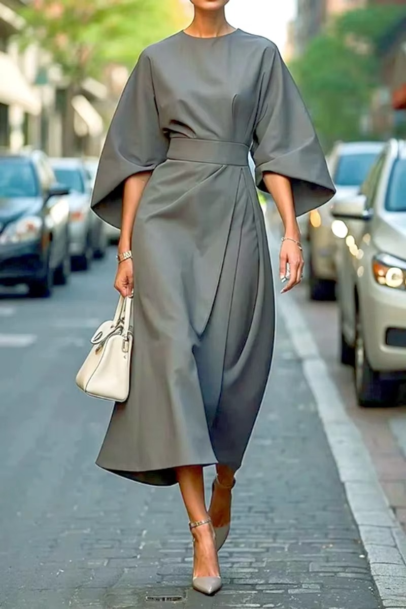 UrbannVibe solid color bat sleeve dress with cinched waist, flowing silhouette, versatile modern fit