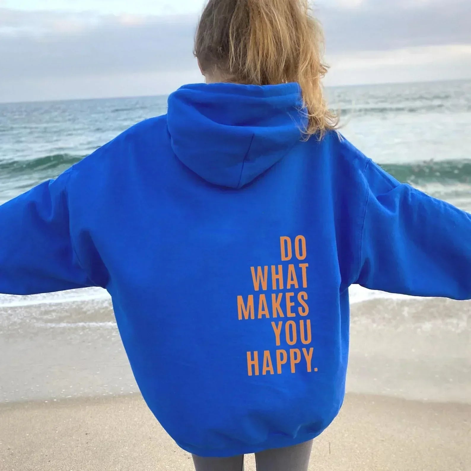 Women's cozy relaxed-fit hoodie in neutral tone with all-season casual silhouette for everyday comfort