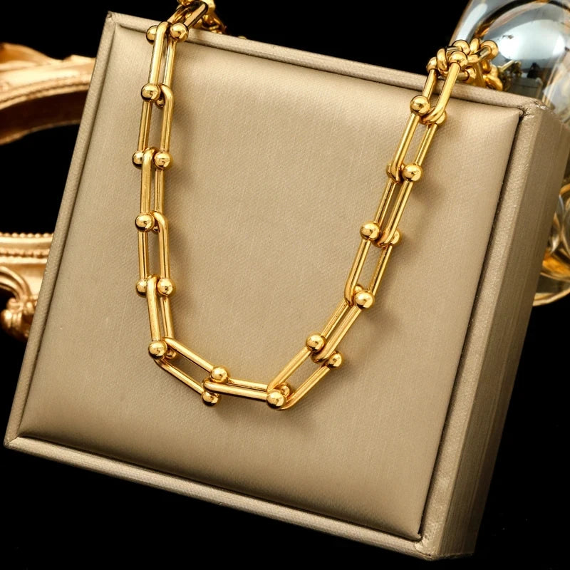 Orsini Astoria gold-plated link chain necklace with polished spherical accents unisex statement jewelry