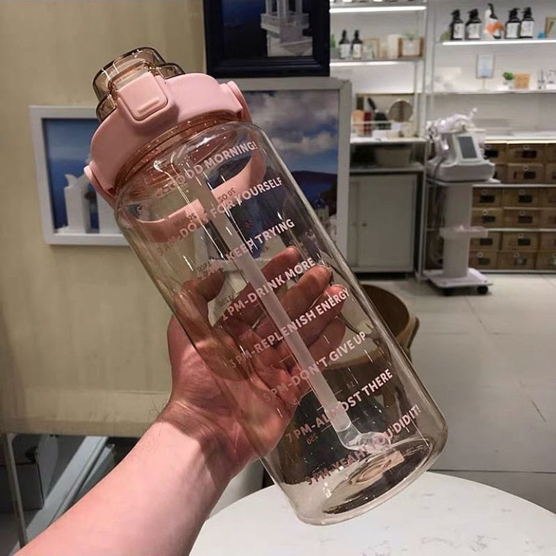 Motivating 2L leakproof water bottle with removable straw, silicone O-ring, and time markers for hydration