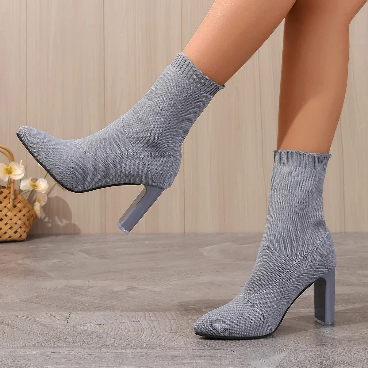 Pale blue knitted sock boot with stretch ankle-hugging silhouette for fashion-forward women