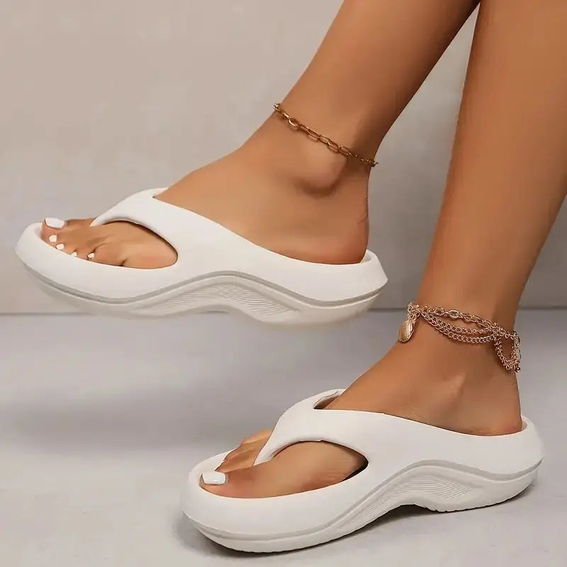 Beige platform flip flops with ultra-thick cushioned sole and cloud-soft arch support for all-day wear
