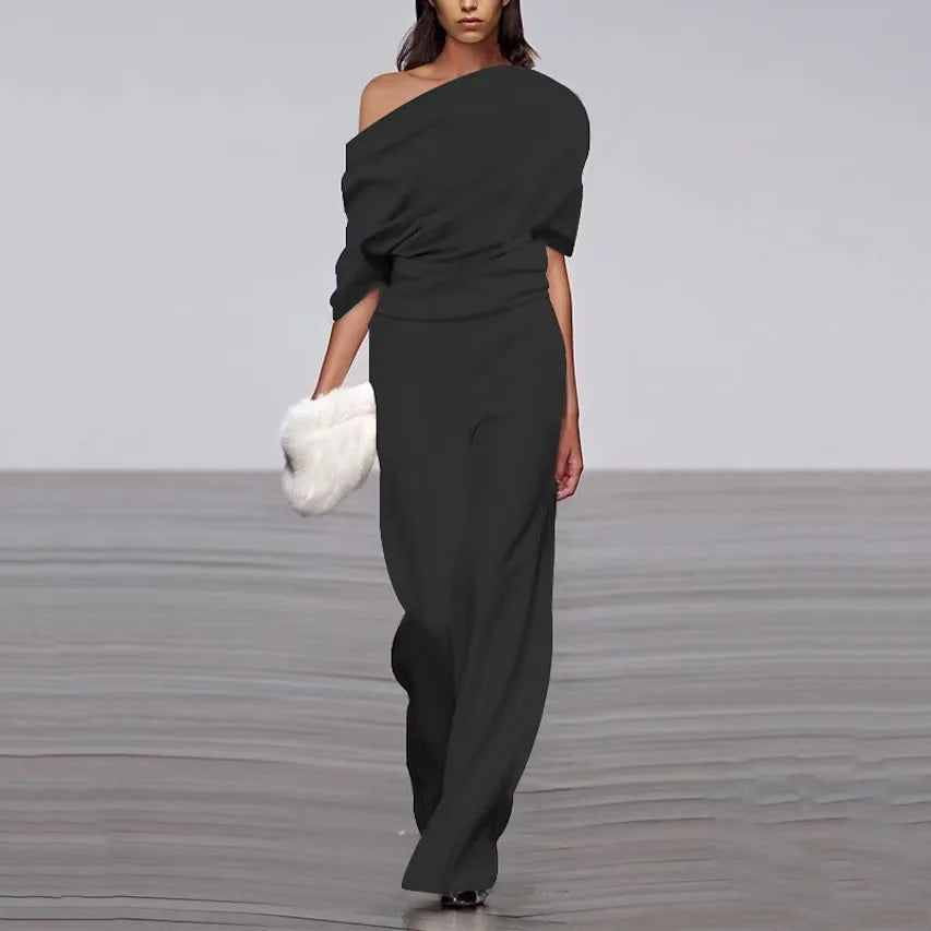 Elegant black off-shoulder wide-leg jumpsuit for women with flattering feminine neckline