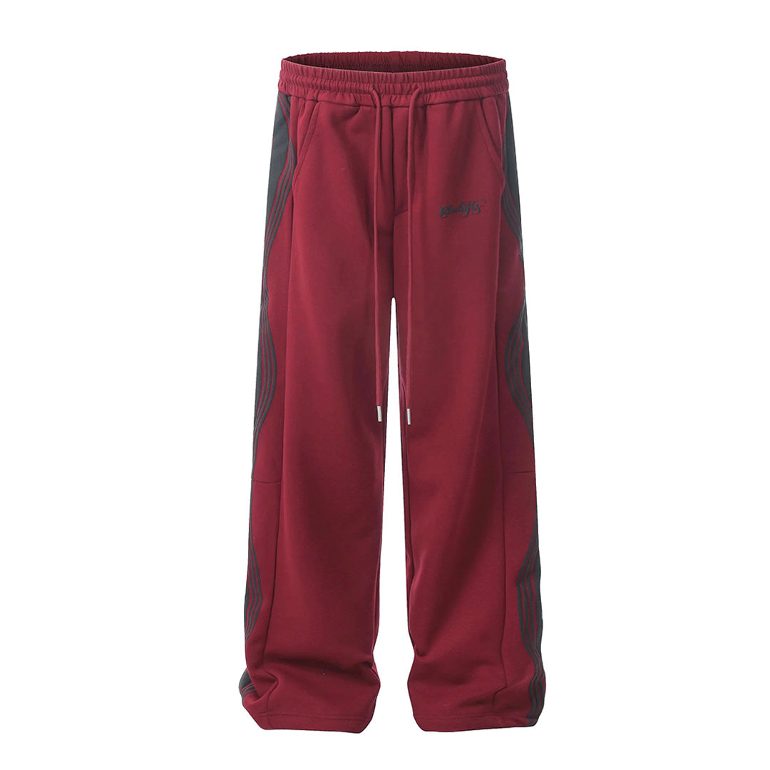 Men's loose fit track pants with wavy side stripe, drawstring waist, cotton-poly blend athletic style