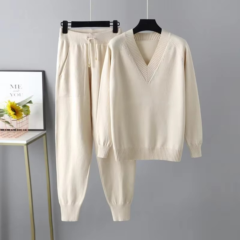 Women's knitted V-neck sweater and pants two-piece set in soft autumn tones relaxed cozy silhouette