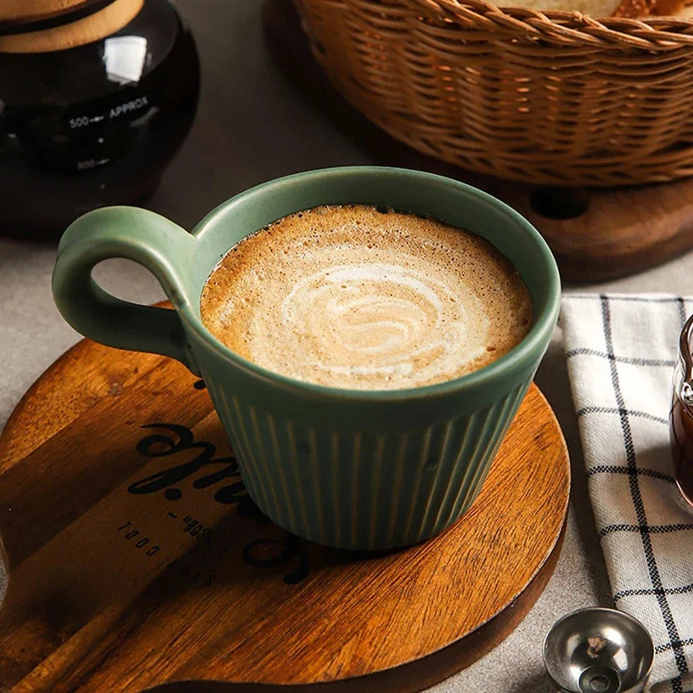 Handcrafted vintage ceramic coffee mug with artisan design, earthy tones, timeless old-world charm