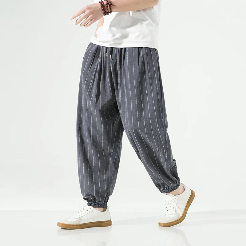 Men's relaxed fit premium cotton pinstripe trousers with elastic waistband in classic stripe pattern
