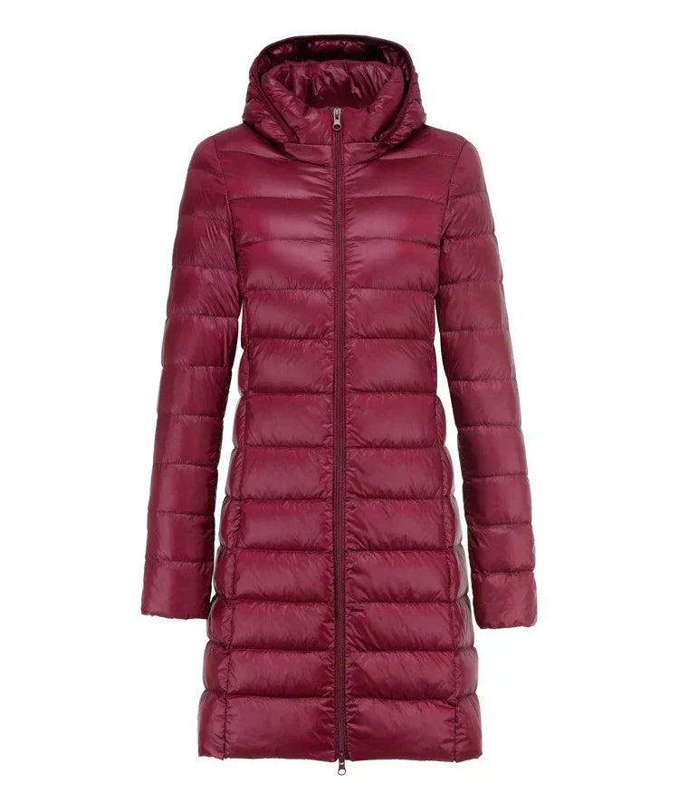 Long hooded puffer rain jacket lightweight waterproof quilted insulation sleek streamlined silhouette